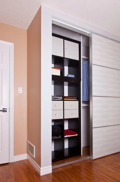 Built-in closet with sliding door shelving storage organization — Stock Photo, Image