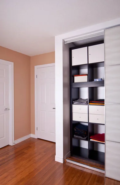 Built-in closet with sliding door shelving storage organization