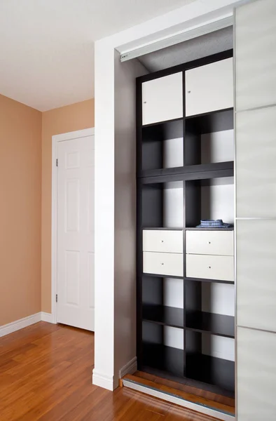 Built-in closet with sliding door shelving storage organization — Stock Photo, Image