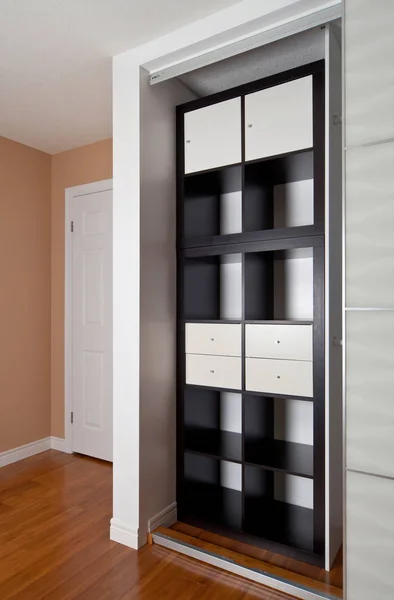 Built-in closet with sliding door shelving storage organization — Stock Photo, Image