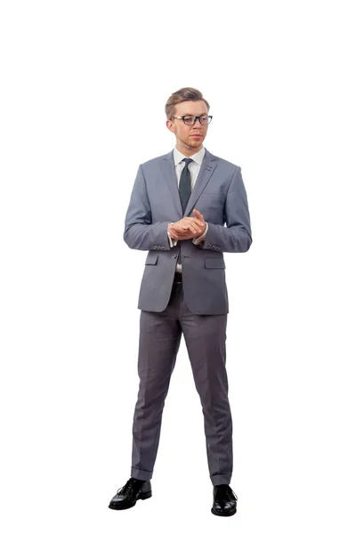 Young man in a business suit wearing glasses — Stock Photo, Image