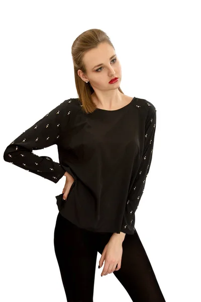 Mooi jong meisje in een zwarte blouse — Stockfoto
