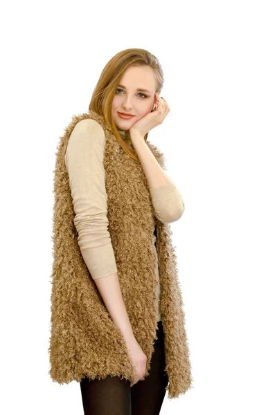 Beautiful young girl in a vest an artificial fur — Stock Photo, Image