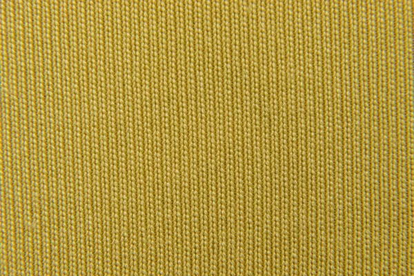 Abstracte achtergrond van gele stof close-up — Stockfoto