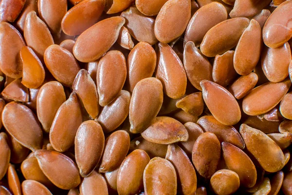 Background of small flax seeds close-up — Stock Photo, Image