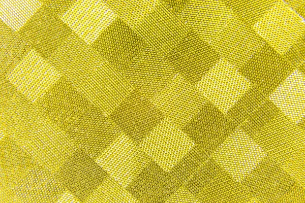Yellow golden checkered shiny paper background — Stock Photo, Image