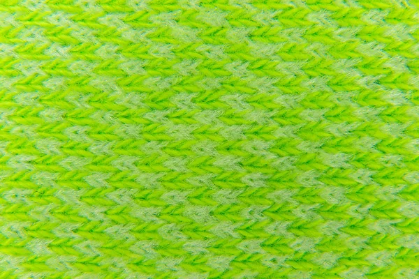 Background from a canvas of green color knitted with woolen thr — Stock Photo, Image