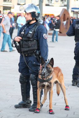 French policeman with the dog in Marseille clipart