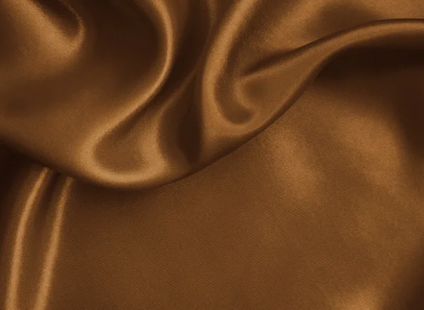 光滑优雅金色丝绸或缎子纹理作为背景。在 Se — 图库照片