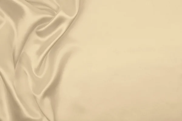 光滑优雅金色丝绸或缎子豪华布料纹理作为韦德 — 图库照片