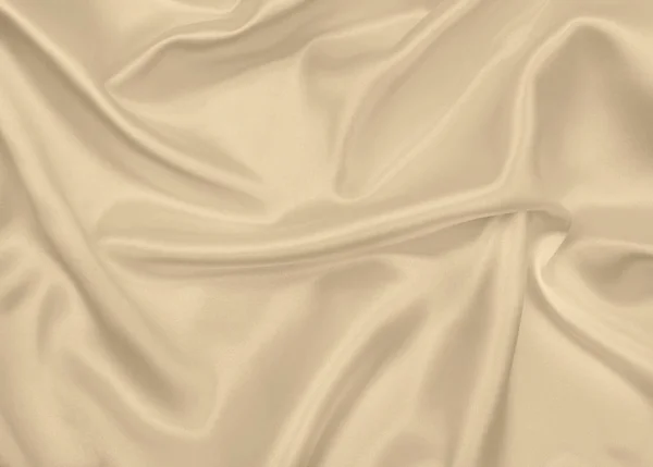 Texture lisse élégante en soie dorée ou en tissu de luxe satiné comme wedd — Photo