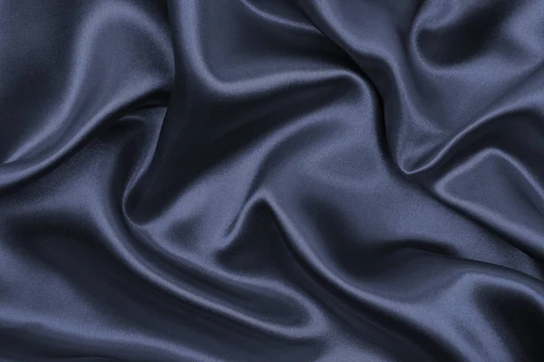 Гладка елегантна темно-сіра шовкова або атласна текстура як абстрактний фон — стокове фото