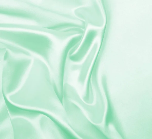 Ομαλή και κομψό πράσινο μετάξι ή υφή υφάσματος σατέν πολυτελείας, όπως adstr — Φωτογραφία Αρχείου