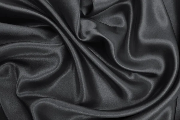 Hladká elegantní tmavě šedé hedvábí nebo satén textury jako abstraktní pozadí — Stock fotografie