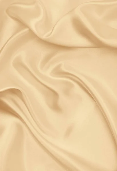 Soepele elegante gouden zijde of Satijn luxe doek textuur als wedd — Stockfoto