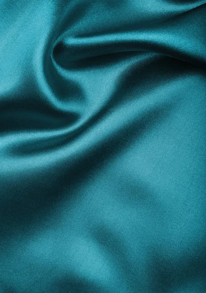 Gładkie elegancki niebieski struktury jedwabiu lub satyny jako tło — Zdjęcie stockowe