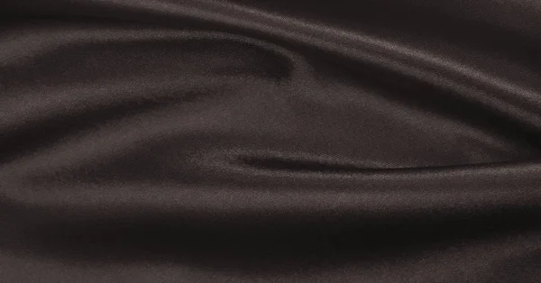 Hladká elegantní hnědé hedvábí nebo satén textury jako abstraktní poza — Stock fotografie