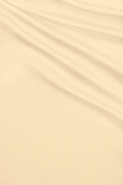Soepele elegante gouden zijde of Satijn luxe doek textuur als wedd — Stockfoto