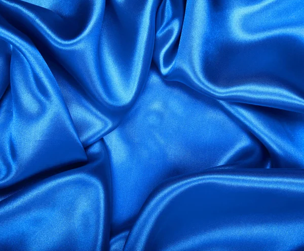 Glatte, elegante blaue Seide oder luxuriöse Stofftextur aus Satin als Abstraktion — Stockfoto