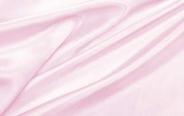 Glatte elegante rosa Seide oder Satin Textur als Hochzeitshintergrund. — Stockfoto