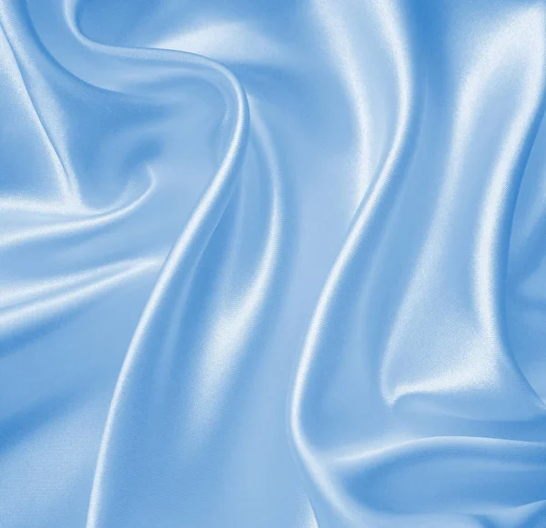 Liso elegante seda azul o satén como fondo —  Fotos de Stock