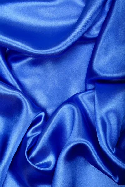 Soepele elegante blauwe zijde of Satijn luxe doek textuur als abstra — Stockfoto