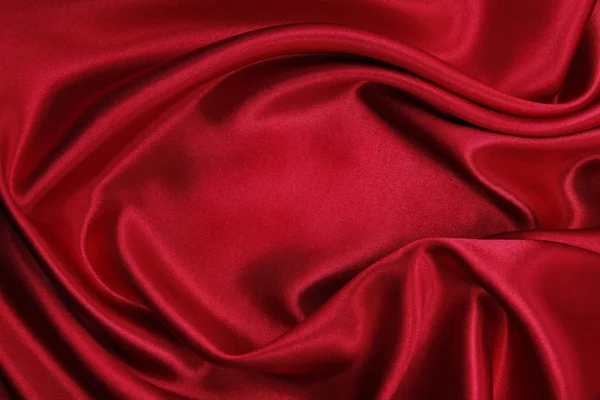 Гладка елегантна червона шовкова або атласна розкішна текстура тканини як абстрактна — стокове фото