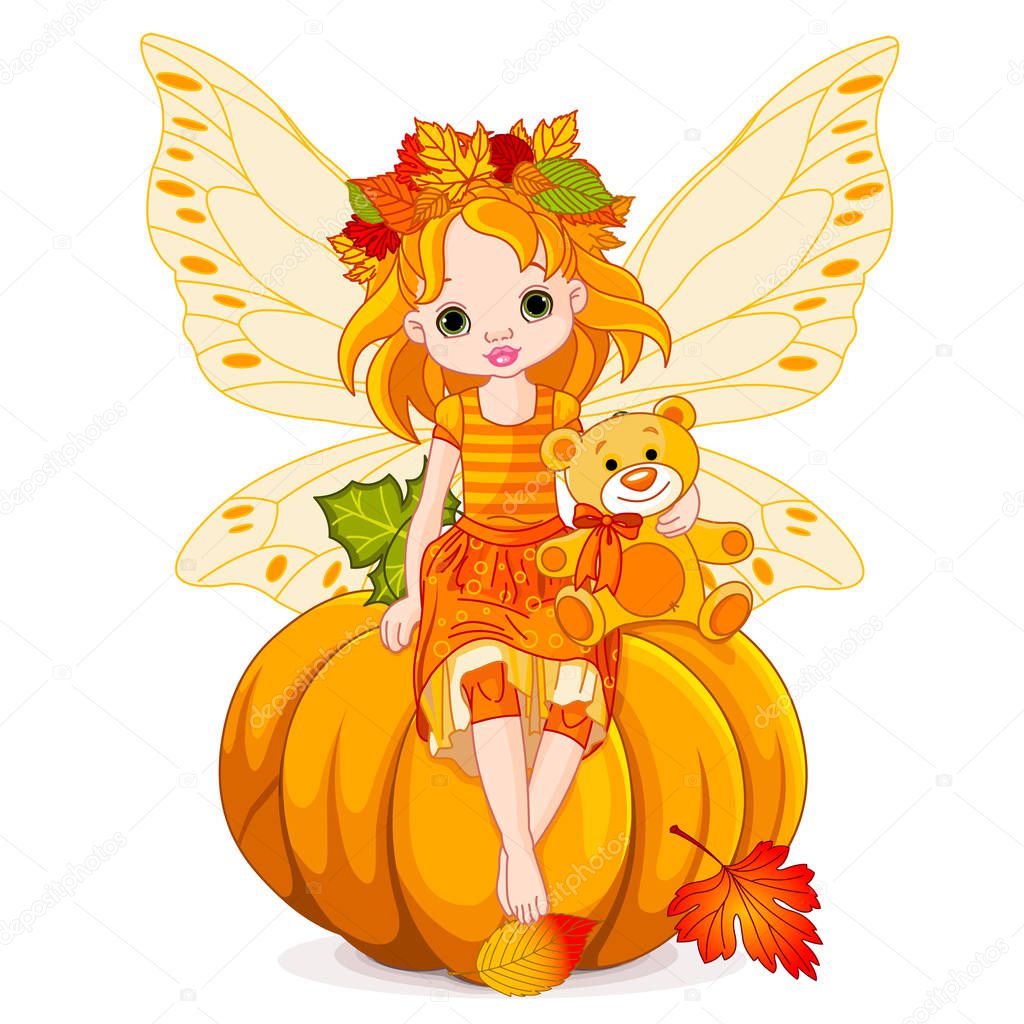  fairy sitting on pumpkin