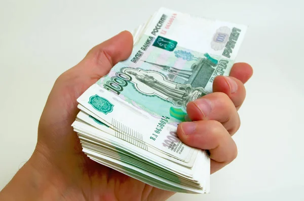 Many rubles in hand. — Stock Photo, Image
