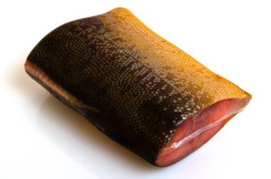 Pembe somon vakum ambalaj içinde bir parça.