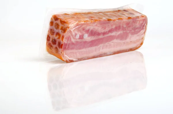 Speck in Vakuumverpackung. — Stockfoto