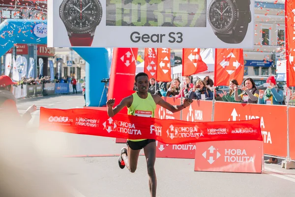 Anbesa Lencho Tesffaye finishes the winner of 21 km distance at the Nova Poshta Kyiv Half Marathon. 09 april 2017. Ukraine Stock Photo