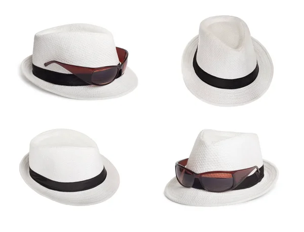 Zonnebril en een witte zomer hoed op een geïsoleerde achtergrond — Stockfoto