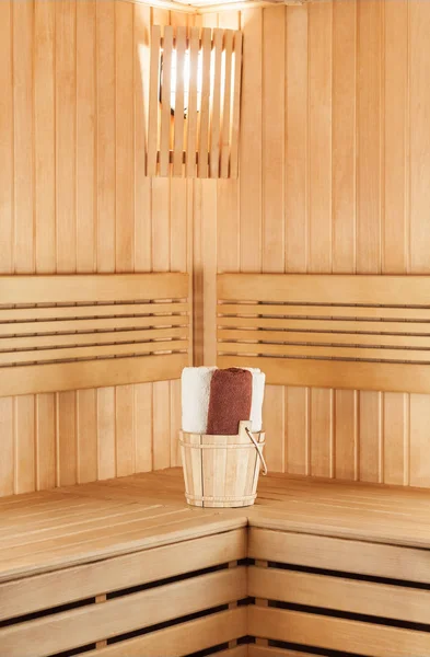 Traditional wooden sauna for relaxation with bucket — Stock Photo, Image