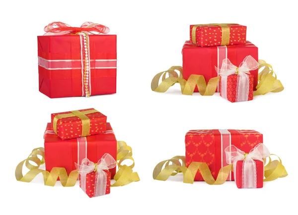 Conjunto de cajas de regalo navideñas decoradas con arcos y cintas — Foto de Stock