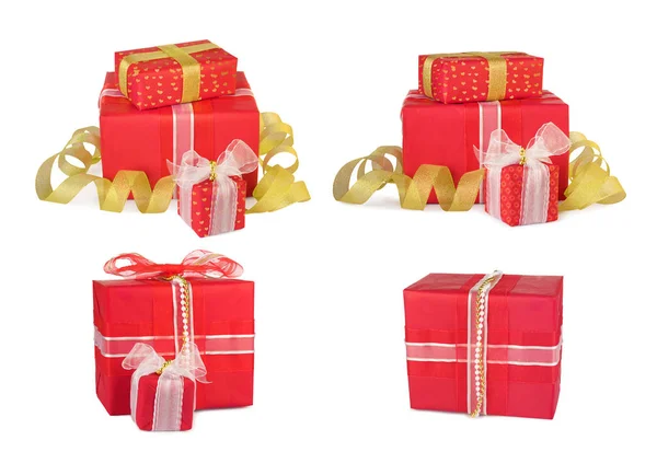 Conjunto de cajas de regalo navideñas decoradas con arcos y cintas —  Fotos de Stock