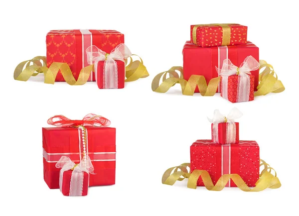 Conjunto de cajas de regalo navideñas decoradas con arcos y cintas — Foto de Stock