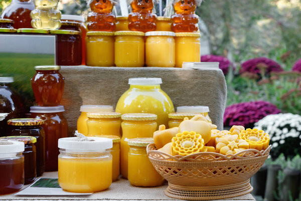 Honey sale in the street food market during the agricultural festival. 