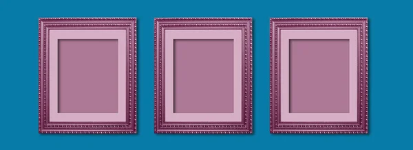 Set of wooden purple frames on  bright blue background. Simple mockup for design. Copy space for  your text.
