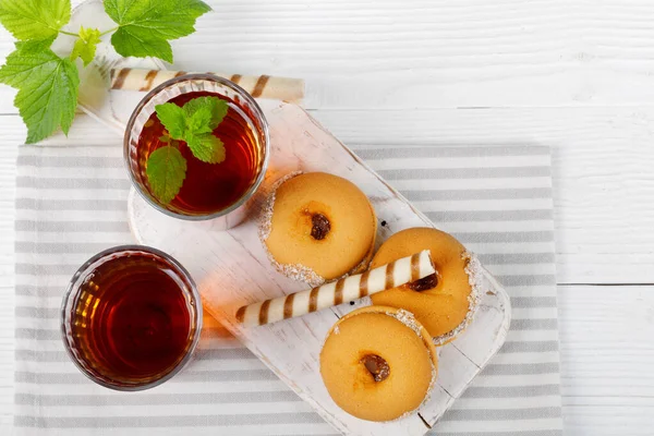 Two Cups Hot Tea Delicious Cookies White Wooden Table Top — Stock Photo, Image