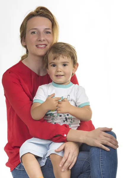 Młoda kobieta trzyma jej syna — Zdjęcie stockowe