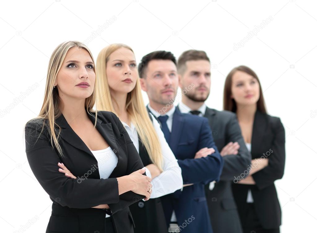 Team of successful and confident people posing on a white backgr