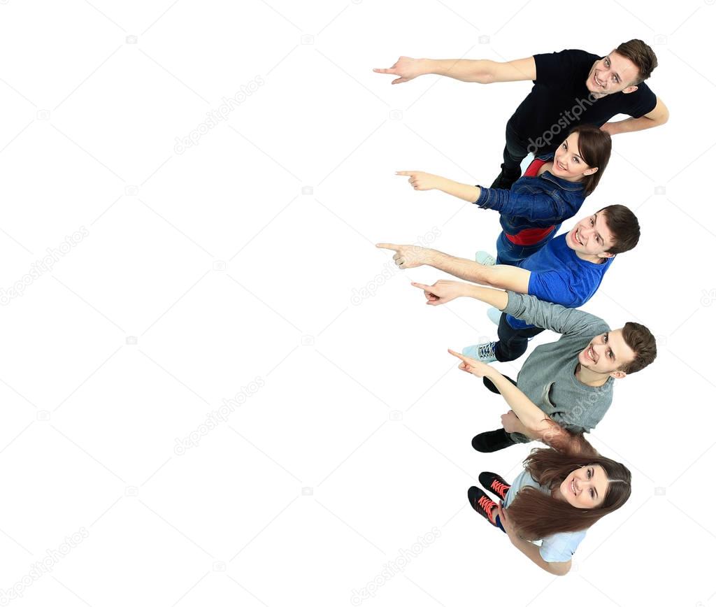 group of young people pointing at something