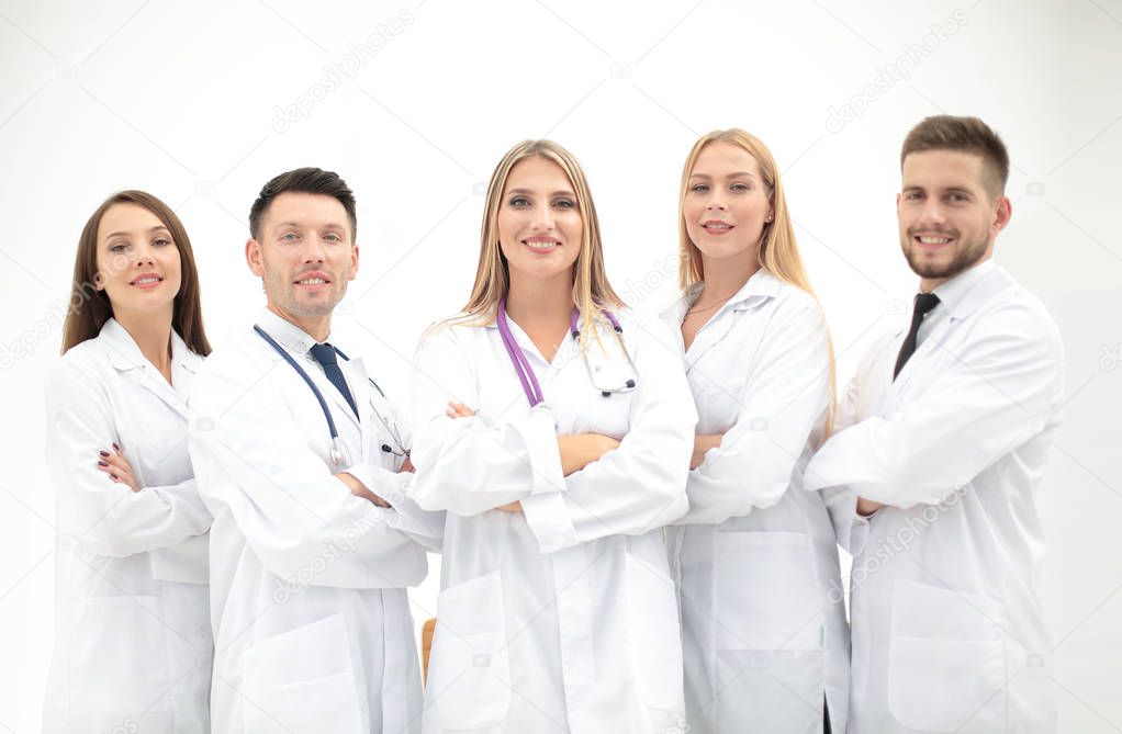 Team of medical professionals  looking at camera, smiling.