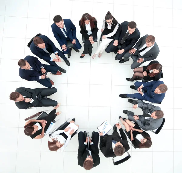 Happy business team pointing at something — Stock Photo, Image