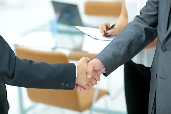 Successful handshake of business men in a working environment — Stock Photo, Image