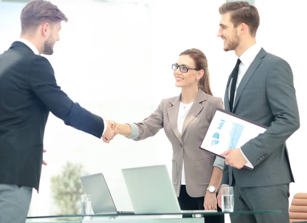 Business people shaking hands  in an office — Stock Photo, Image