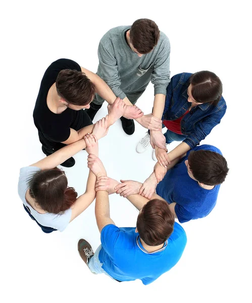 Vista superior de los jóvenes con las manos juntas en un círculo . — Foto de Stock