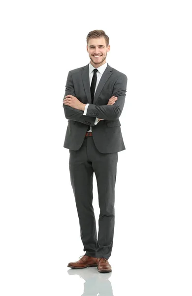 Portrait in full length of a smiling young businessman with a st Royalty Free Stock Photos