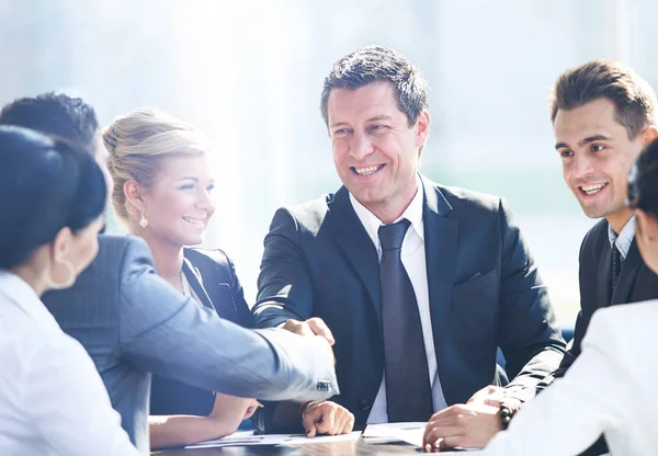 Two businessmen handshaking after striking grand deal — Stock Photo, Image